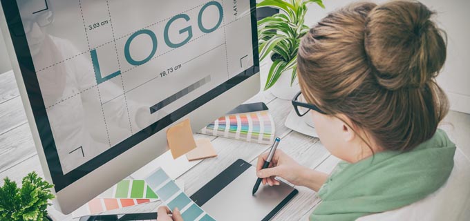 Graphic designer at work. Color samples.